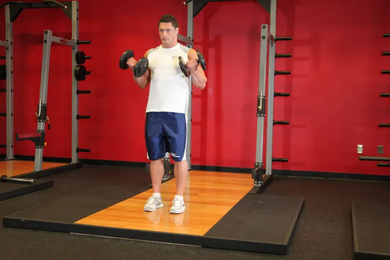 Biceps curl met dumbbells, eindpositie