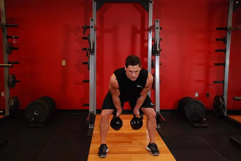 Clean met twee kettlebells