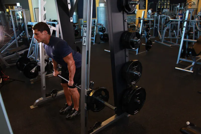 Gebogen roeien in de Smith machine