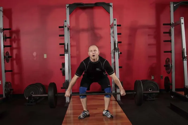 Hang snatch onder de knieën