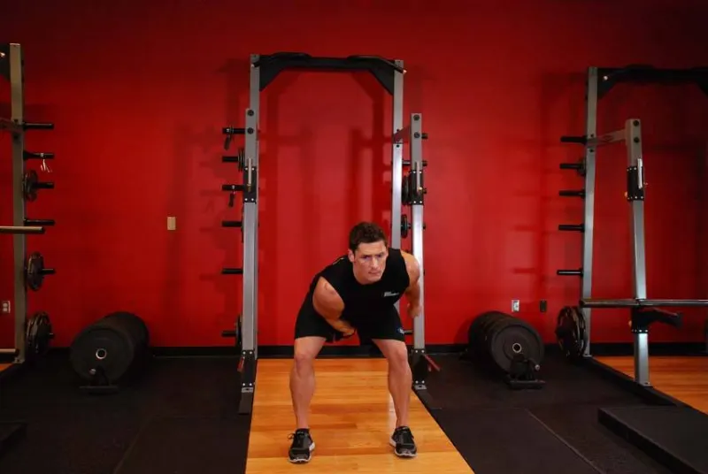 Kettlebell snatch met één arm, eindpositie