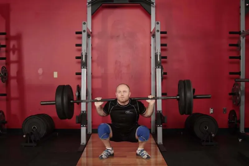 Olympic squat, eindpositie