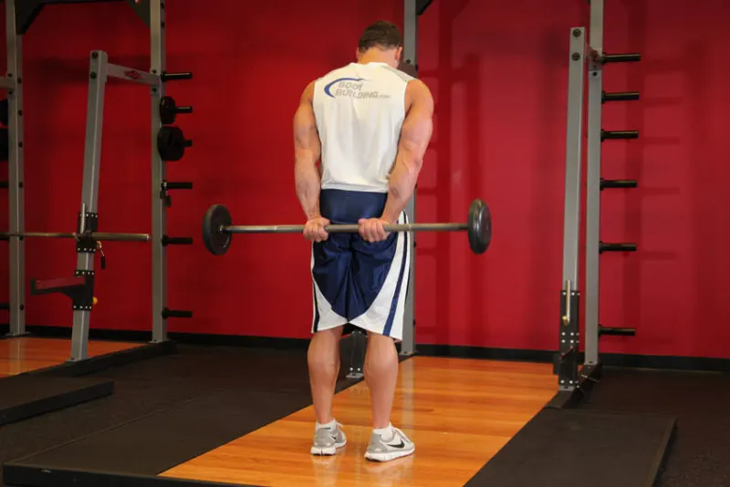Polscurl achter je rug met barbell