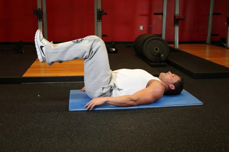 Reverse crunch op de grond