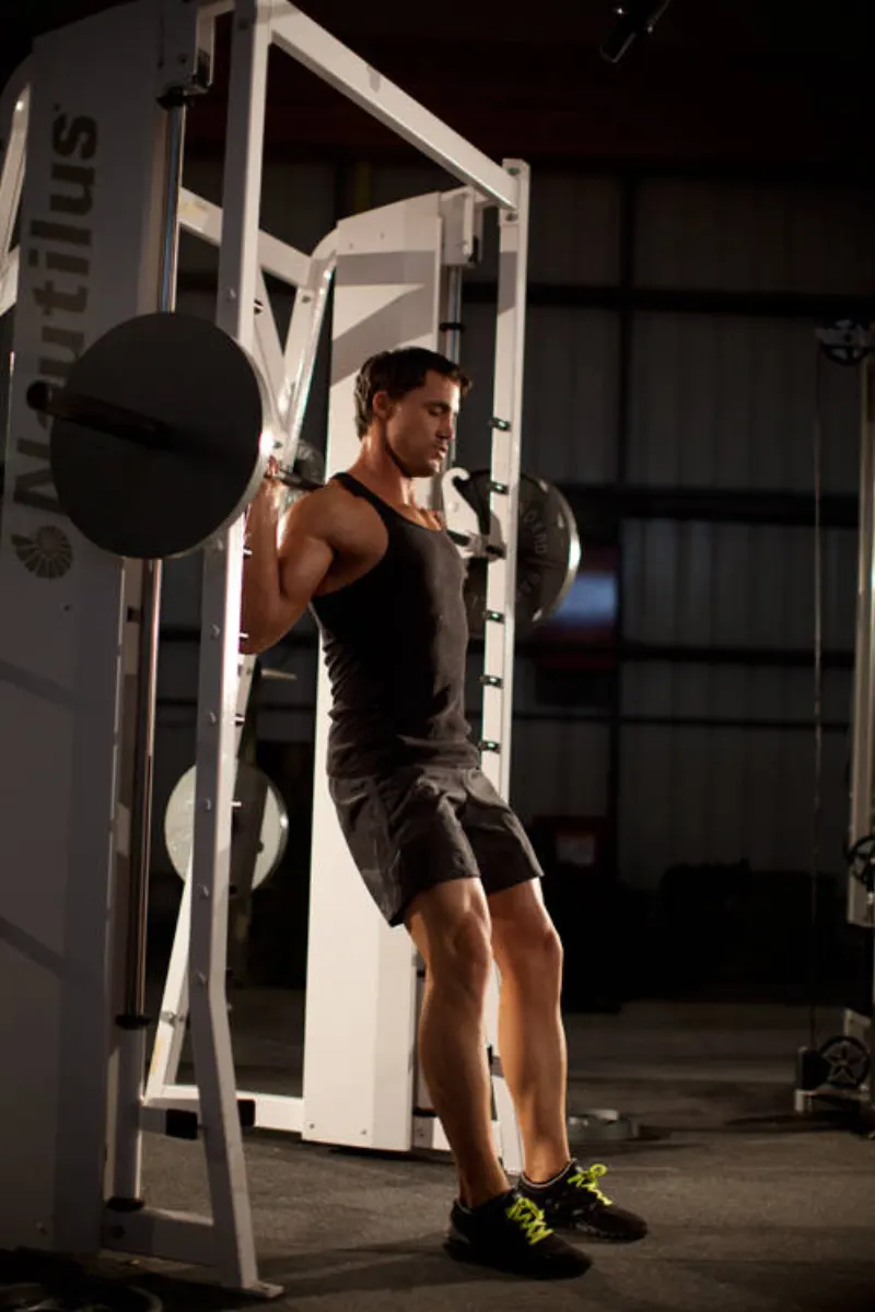 Squat in de Smith machine, beginpositie
