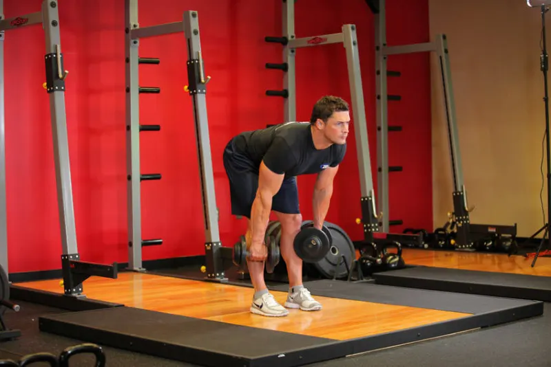 Stiff-leg deadlift met dumbbells, eindpositie