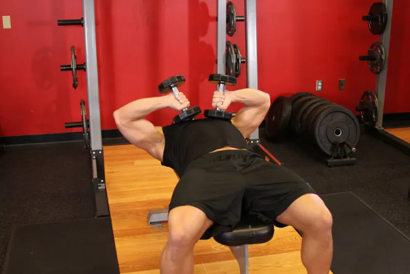 Tate press met dumbbells, beginpositie